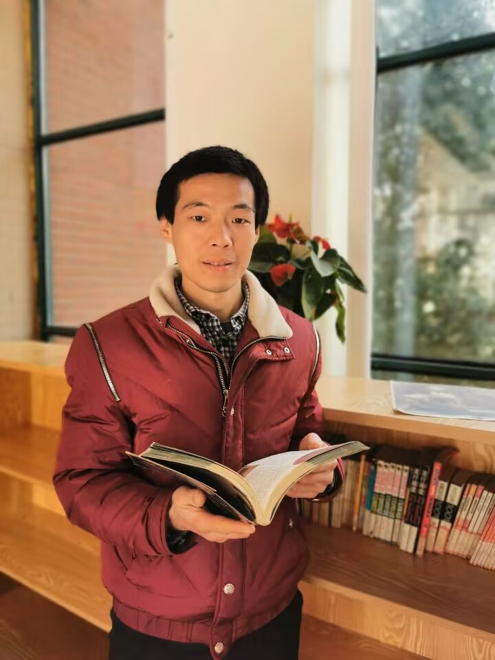 纪明亮.jpg